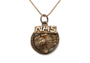 Harriet Morris bronze NHS Bear medallion, worn as a pendant